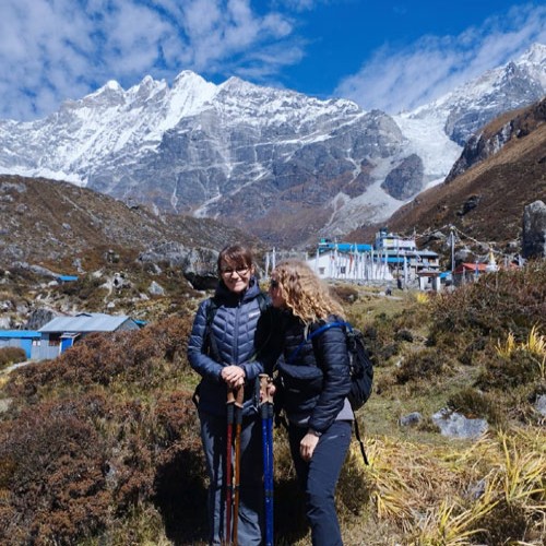 First-time trekkers walking on the Langtang Valley Trek toward Kyanjin Gompa