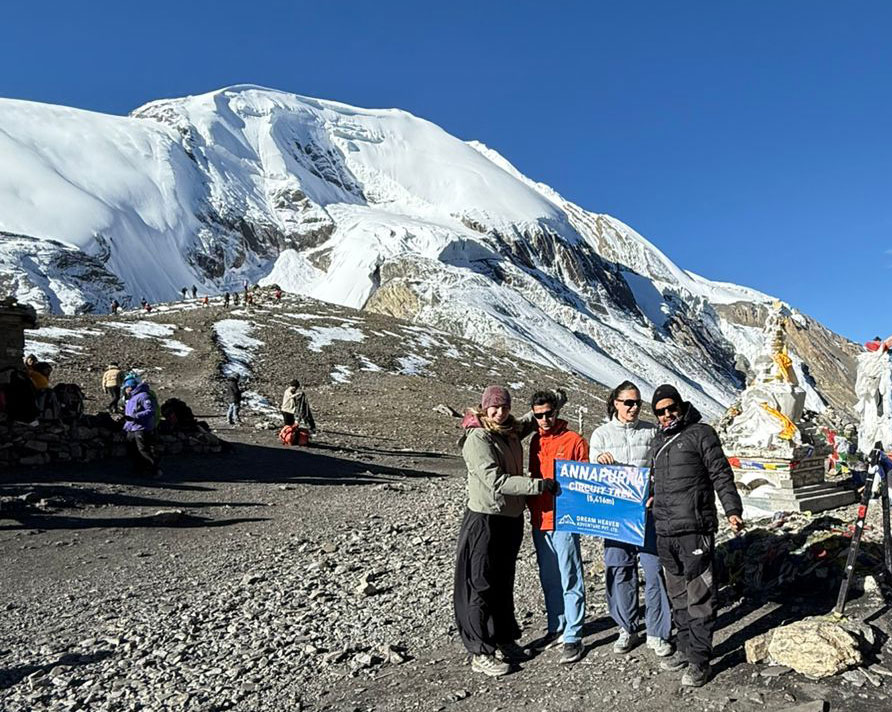 Licensed guide trekking with clients on the Annapurna Circuit Trek in Nepal