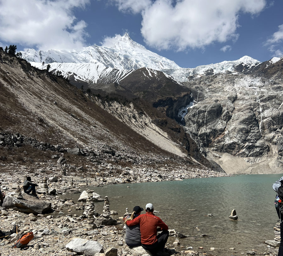 Trekkers visiting Birendra Lake near Samagaun on the Manaslu Circuit Trek
