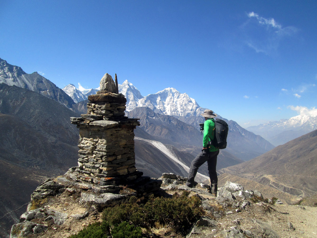 Everest Base Camp trekkers near a traditional chorten in the Khumbu region