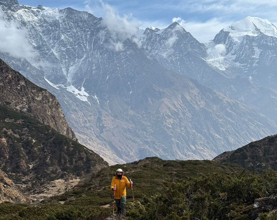 Trekker on the trail in Tsum Valley, Nepal