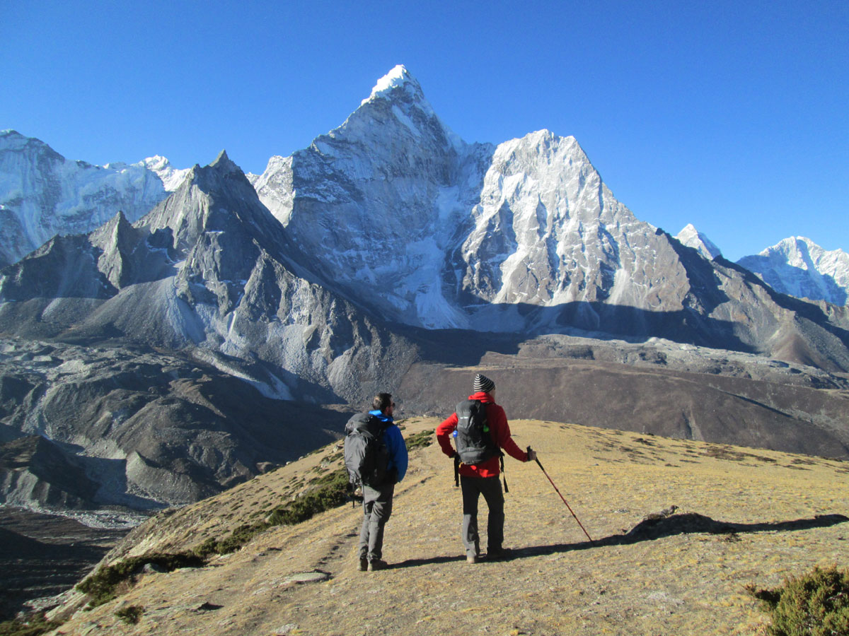 Experienced guide leading trekkers on the Everest Base Camp Trek