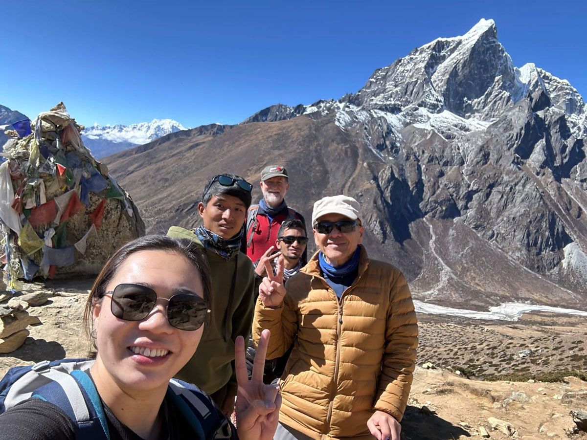 Porter and trekkers on the Everest Base Camp route