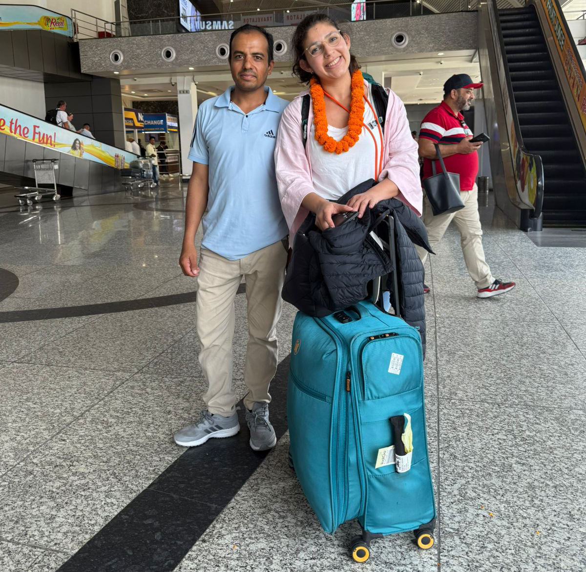 Female trekker meeting her trekking representative at Kathmandu airport