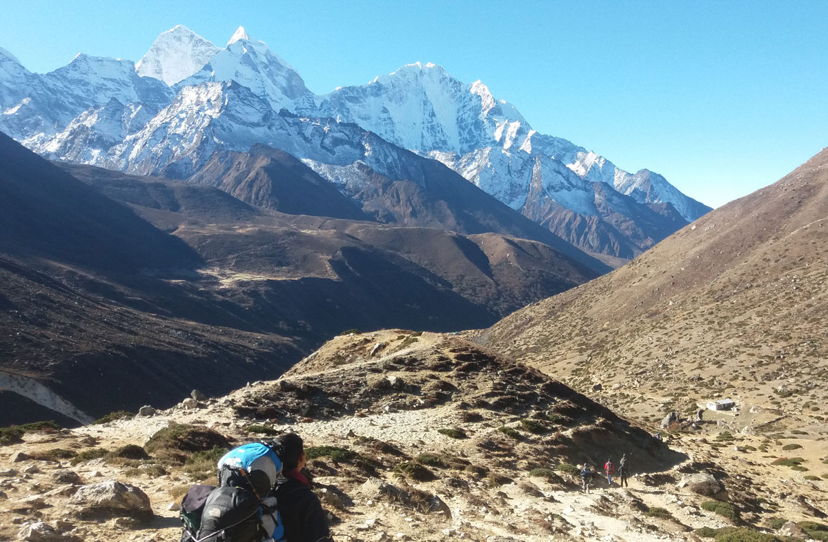 Indian travellers enjoying the Himalayan scenery on the trek to Everest Base Camp