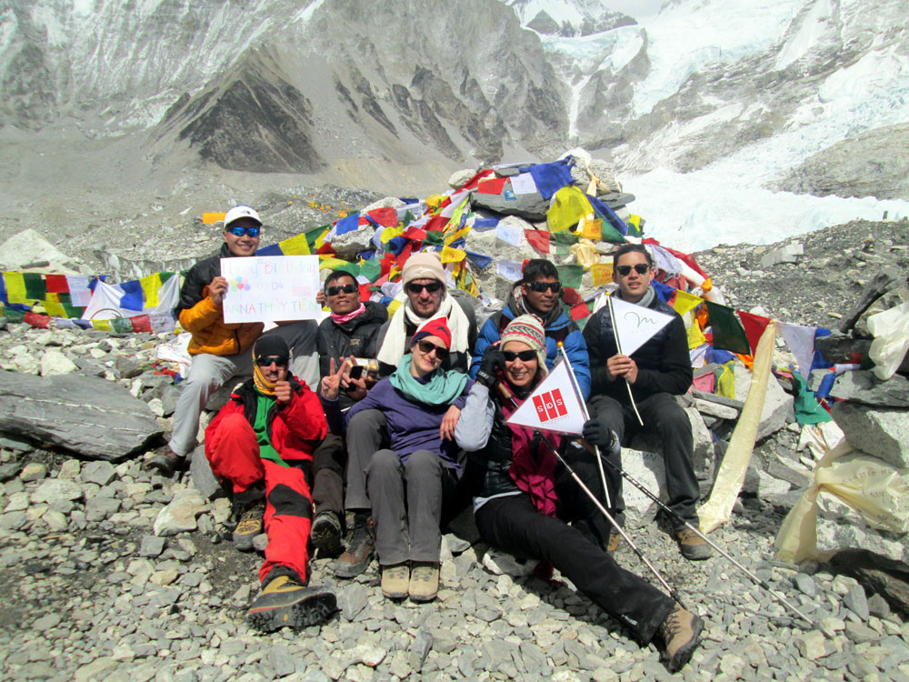 Local Everest guide assisting trekkers during the Everest Base Camp Trek